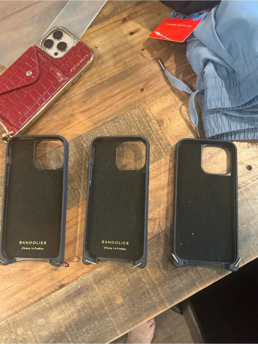 Bandolier Black iPhone 14 Pro Max Case with Gold Logo